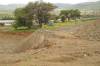 A view of the general area:  earth removal around the cemetery is already in an advanced state.